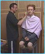 Chris gets stage makeup