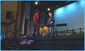 Chris gets last-minute instruction on the stage